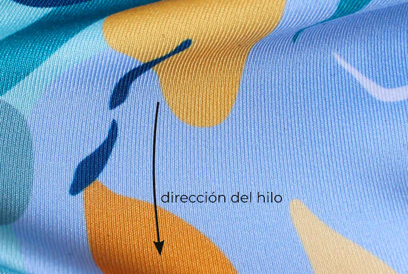 dirección del hilo en tejidos de punto